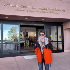 Dr Jack Atkinson standing outside the National Center for Atmospheric Research
