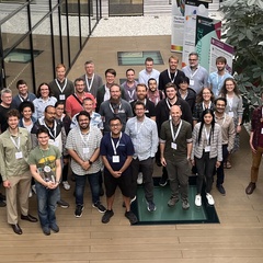 Looking down on group of attendees of Coupling Workshop at the Maxwell Centre
