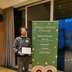 Tom Meltzer with his professional services award