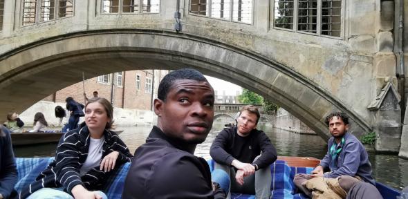 Picture of people on punts next to bridge of sighs